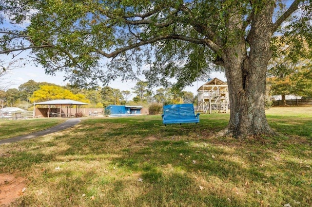 view of yard with a detached carport