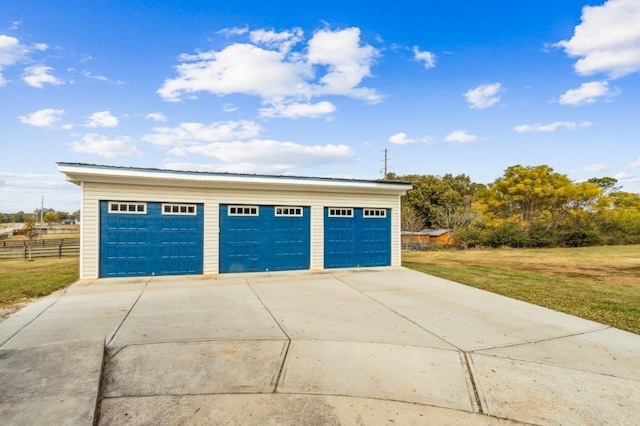 detached garage with fence