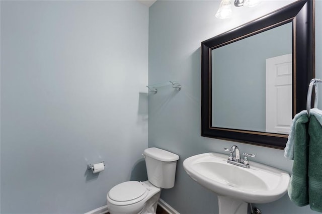 4855 Payson Ter SE Unit 3, Atlanta, GA 30339 - half bath with toilet, baseboards, and a sink