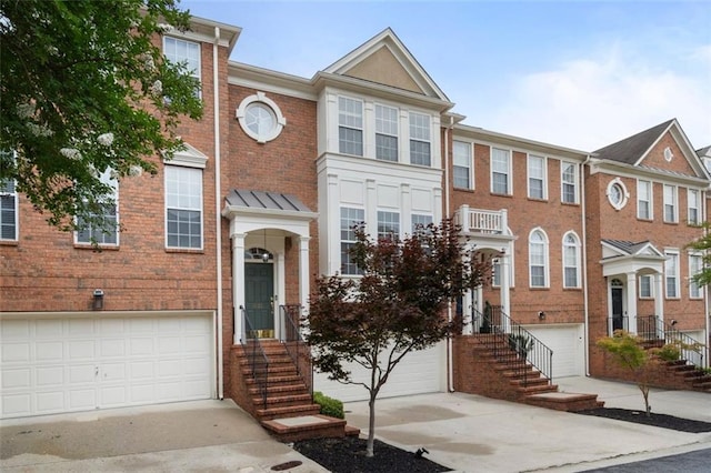 4855 Payson Ter SE Unit 3, Atlanta, GA 30339 - multi unit property featuring an attached garage, concrete driveway, and brick siding