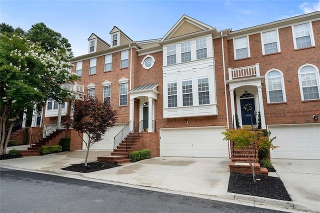 4855 Payson Ter SE Unit 3, Atlanta, GA 30339 - multi unit property with a garage, concrete driveway, and brick siding
