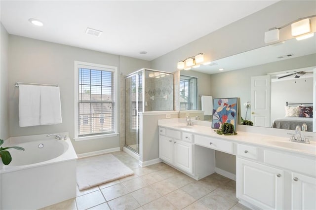 4855 Payson Ter SE Unit 3, Atlanta, GA 30339 - full bath featuring double vanity, a bath, connected bathroom, tile patterned floors, and a stall shower