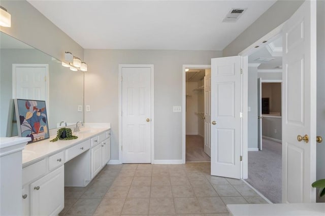 4855 Payson Ter SE Unit 3, Atlanta, GA 30339 - bathroom featuring double vanity, baseboards, and tile patterned flooring
