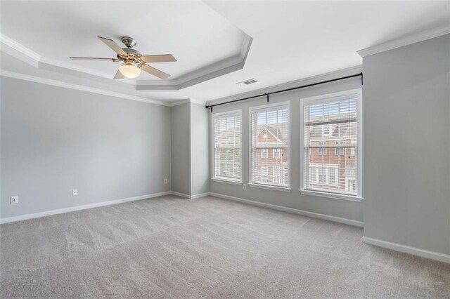 4855 Payson Ter SE Unit 3, Atlanta, GA 30339 - carpeted empty room with a raised ceiling, crown molding, ceiling fan, and baseboards