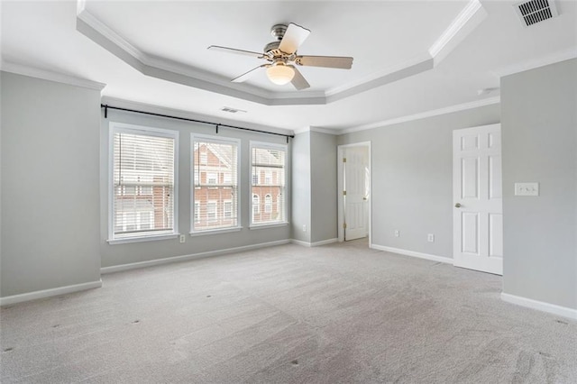 4855 Payson Ter SE Unit 3, Atlanta, GA 30339 - spare room featuring a tray ceiling, a ceiling fan, carpet, crown molding, and baseboards