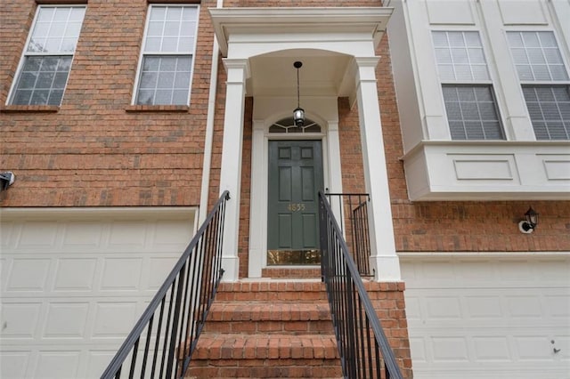 4855 Payson Ter SE Unit 3, Atlanta, GA 30339 - entrance to property with a garage and brick siding