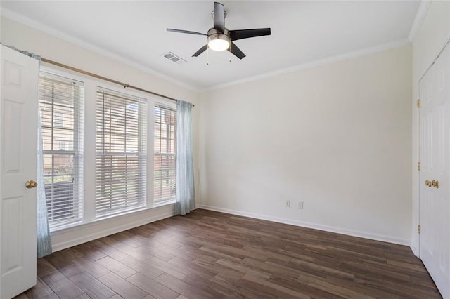 4855 Payson Ter SE Unit 3, Atlanta, GA 30339 - spare room with dark wood finished floors, a ceiling fan, baseboards, and crown molding