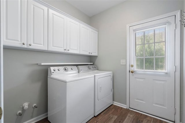 4855 Payson Ter SE Unit 3, Atlanta, GA 30339 - washroom with independent washer and dryer, cabinet space, dark wood-style flooring, and baseboards