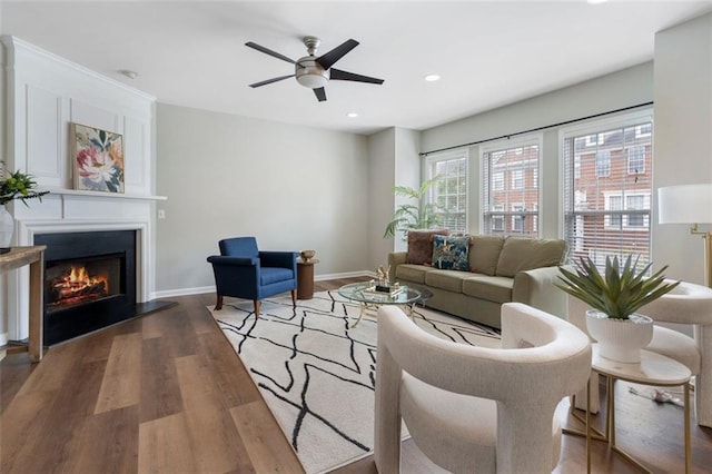 4855 Payson Ter SE Unit 3, Atlanta, GA 30339 - living room featuring wood finished floors, a lit fireplace, ceiling fan, recessed lighting, and baseboards