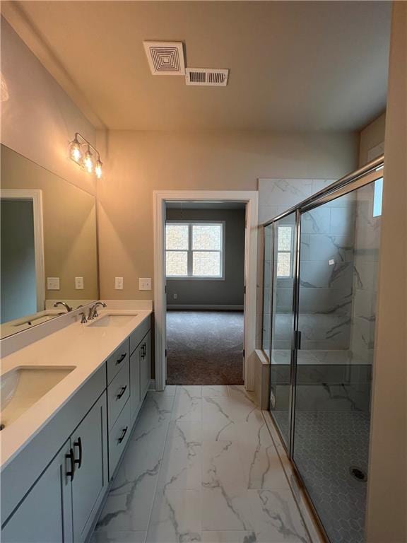 bathroom featuring vanity and walk in shower