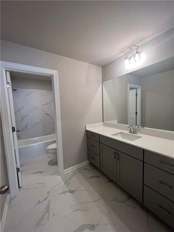 full bathroom with vanity, toilet, and tiled shower / bath combo