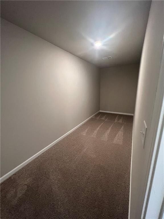 unfurnished room with carpet