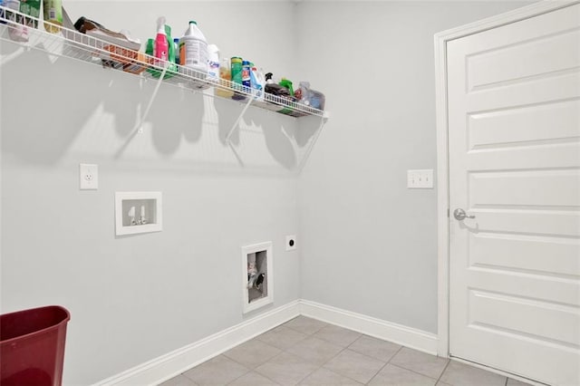 509 Grace Ln, Villa Rica, GA 30180 - laundry area featuring electric dryer hookup, hookup for a washing machine, and light tile patterned flooring