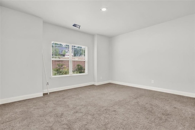 509 Grace Ln, Villa Rica, GA 30180 - carpeted empty room featuring baseboards and recessed lighting