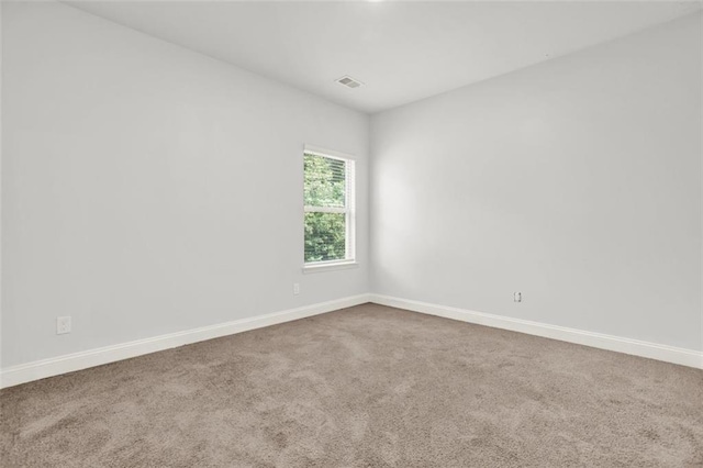 509 Grace Ln, Villa Rica, GA 30180 - carpeted spare room with baseboards