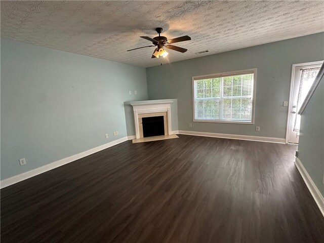 kitchen with black appliances, a textured ceiling, sink, and light hardwood / wood-style floors