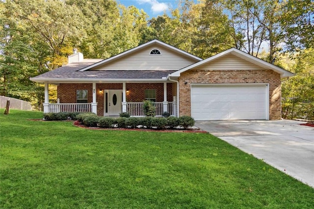 view of front of home with a porch, a front yard, and a garage