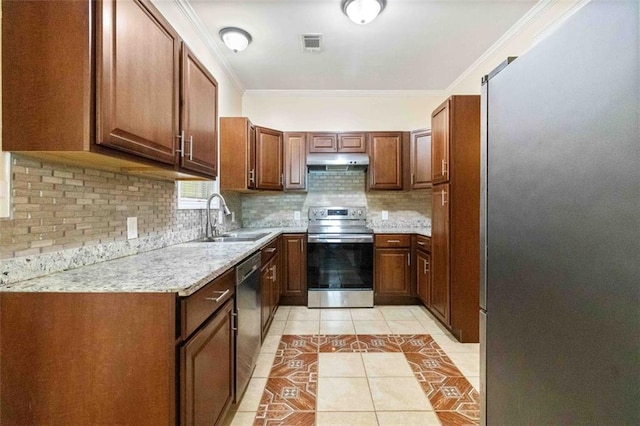 kitchen featuring backsplash, ornamental molding, sink, light tile patterned floors, and appliances with stainless steel finishes