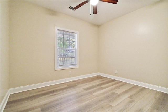 unfurnished room with light hardwood / wood-style flooring and ceiling fan