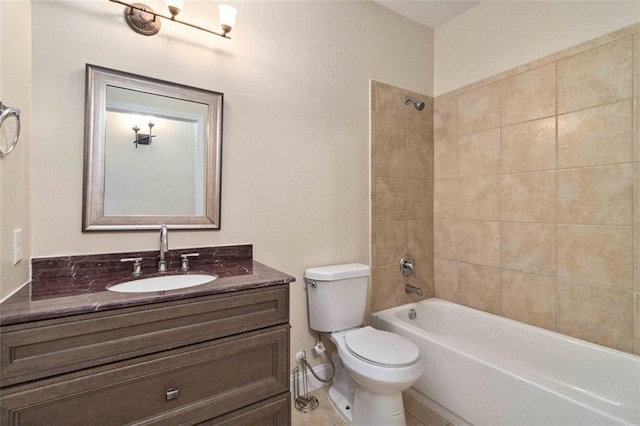 full bathroom featuring vanity, toilet, tile patterned floors, and tiled shower / bath combo