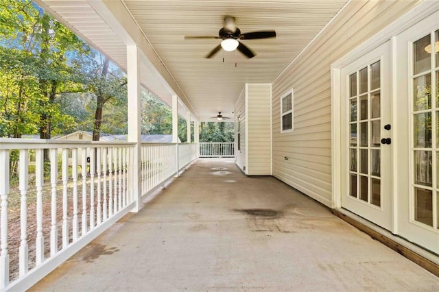 view of patio featuring french doors and ceiling fan