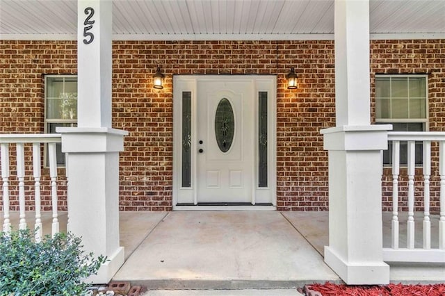 doorway to property with covered porch