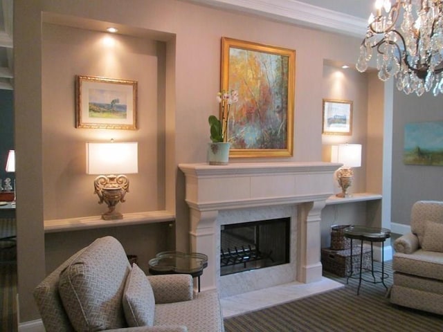 1800 Clairmont Lk Unit 313, Decatur, GA 30033 - carpeted living area featuring a premium fireplace, a chandelier, ornamental molding, and baseboards