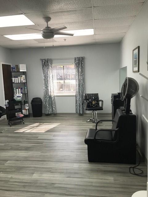 1800 Clairmont Lk Unit 313, Decatur, GA 30033 - sitting room with a ceiling fan, a paneled ceiling, wood finished floors, an office area, and baseboards