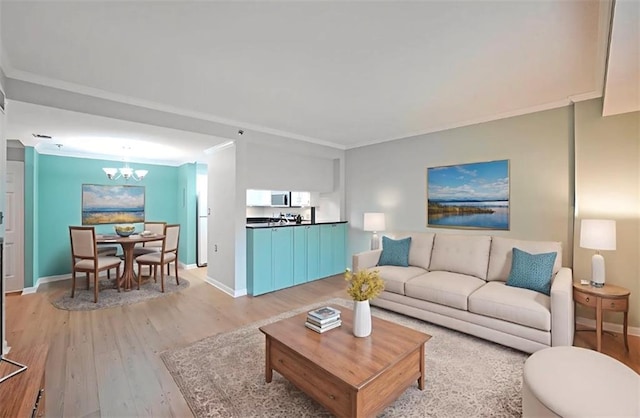 1800 Clairmont Lk Unit 313, Decatur, GA 30033 - living area featuring light wood finished floors, a chandelier, baseboards, and crown molding