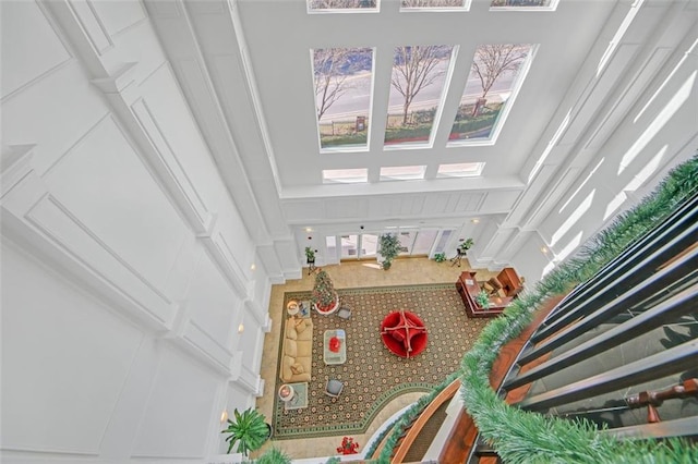 stairs featuring a high ceiling