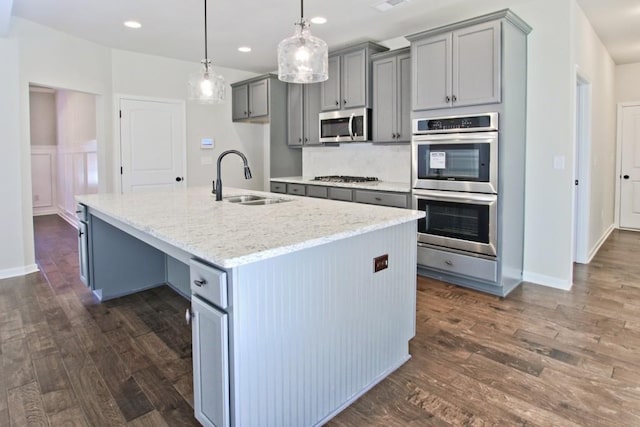 238 Linford Dr, Locust Grove, GA 30248 - kitchen featuring a sink, appliances with stainless steel finishes, gray cabinets, dark wood finished floors, and recessed lighting