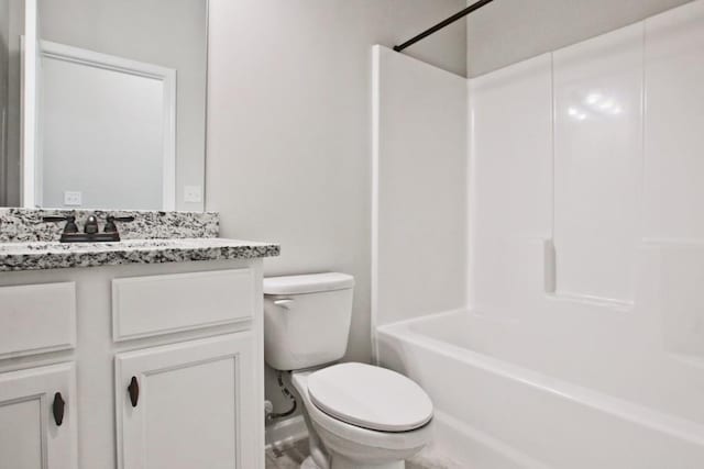 238 Linford Dr, Locust Grove, GA 30248 - bathroom featuring toilet, vanity, and shower / tub combination