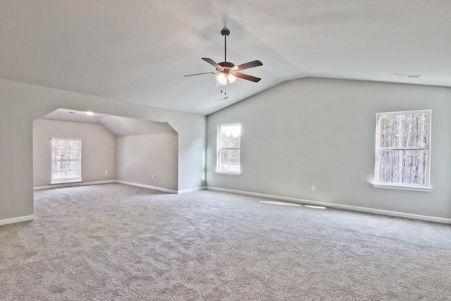 238 Linford Dr, Locust Grove, GA 30248 - additional living space featuring lofted ceiling, ceiling fan, carpet flooring, and plenty of natural light