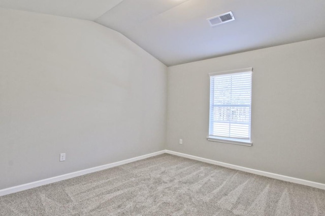 238 Linford Dr, Locust Grove, GA 30248 - unfurnished room featuring vaulted ceiling, carpet flooring, and baseboards