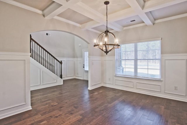 238 Linford Dr, Locust Grove, GA 30248 - unfurnished dining area featuring coffered ceiling, a chandelier, a decorative wall, beam ceiling, and wainscoting
