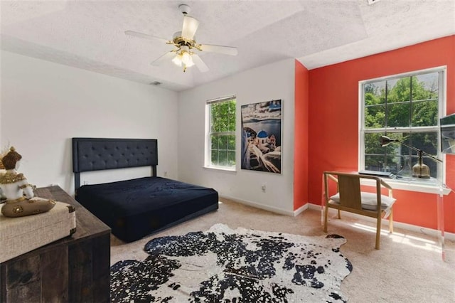 1689 Camden Forrest Way, Riverdale, GA 30296 - bedroom featuring carpet flooring, a textured ceiling, baseboards, and ceiling fan