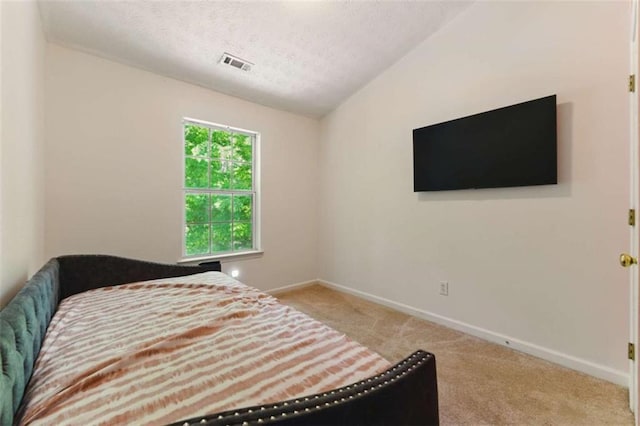 1689 Camden Forrest Way, Riverdale, GA 30296 - bedroom featuring carpet flooring, a textured ceiling, and baseboards