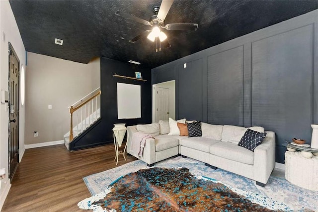 1689 Camden Forrest Way, Riverdale, GA 30296 - living room featuring stairway, a ceiling fan, wood finished floors, and baseboards