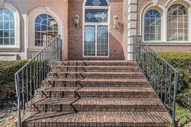 exterior details featuring brick siding