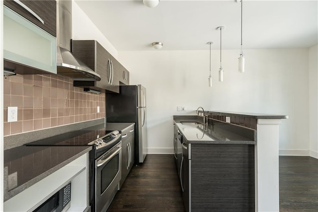 kitchen with decorative light fixtures, sink, dark wood-type flooring, and stainless steel electric range