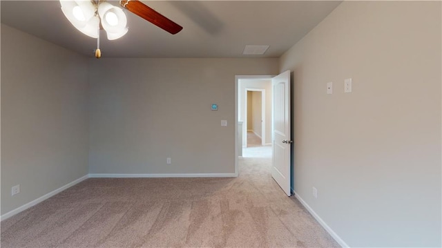 130 Thornwood Dr SW, Rome, GA 30165 - spare room featuring light colored carpet, ceiling fan, and baseboards