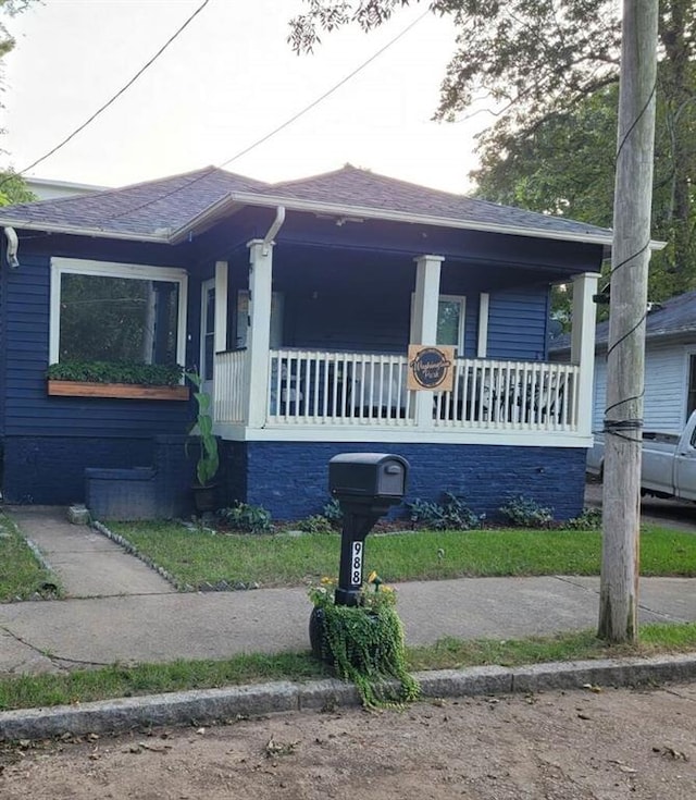 bungalow-style home with covered porch