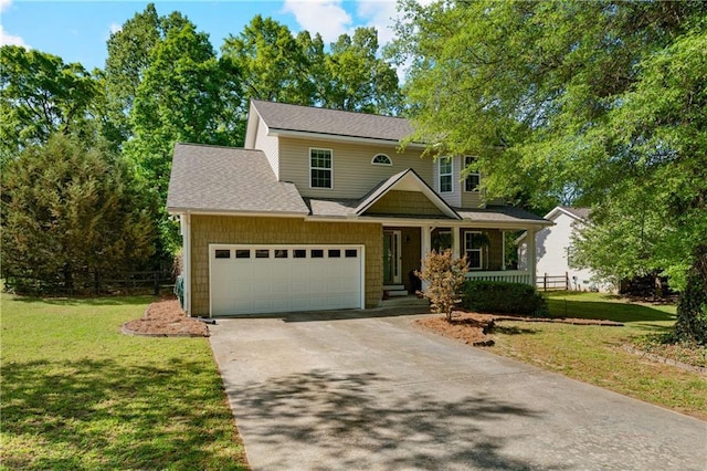 view of front of house featuring a porch, roof with shingles, driveway, and a front yard