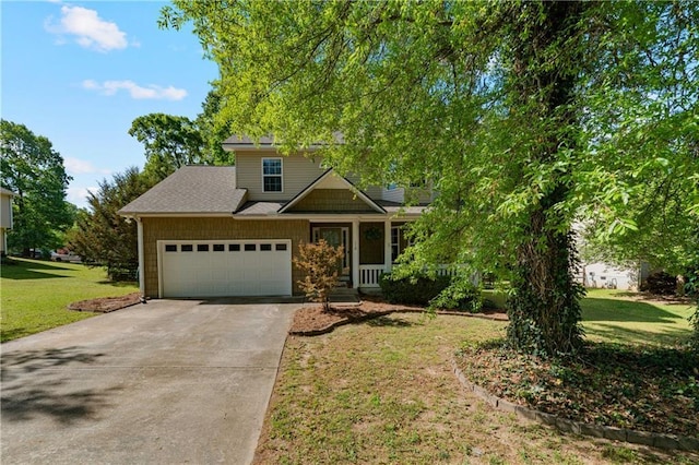 craftsman-style house featuring a garage, concrete driveway, a porch, and a front lawn