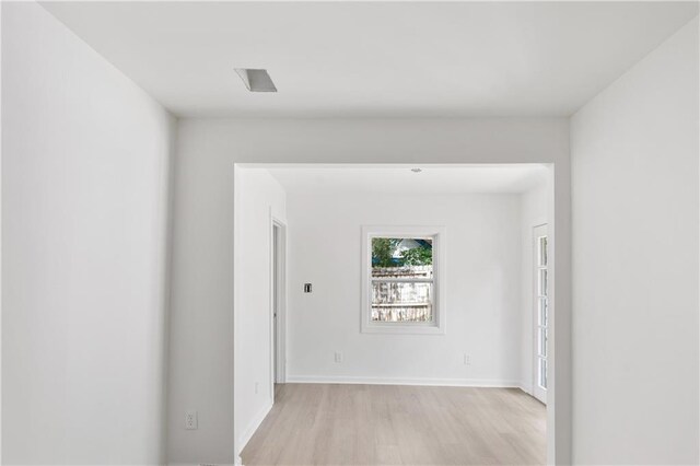 unfurnished room featuring light hardwood / wood-style flooring