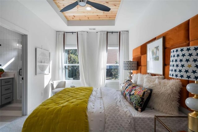 2328 Mason Dr, Atlanta, GA 30316 - carpeted bedroom featuring ceiling fan, ensuite bathroom, wood ceiling, and a raised ceiling
