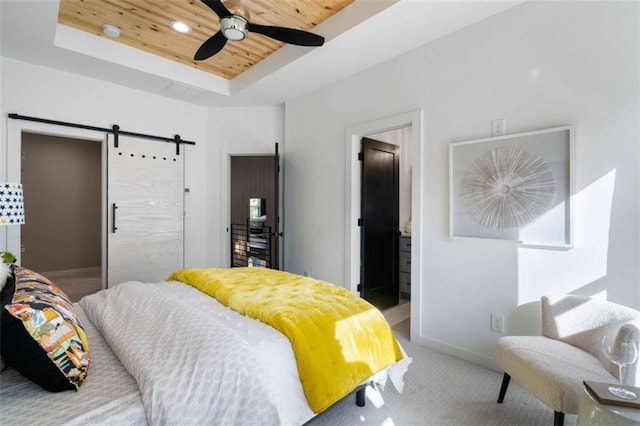 2328 Mason Dr, Atlanta, GA 30316 - bedroom with baseboards, a raised ceiling, a barn door, wood ceiling, and carpet floors