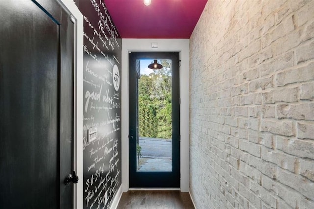 2328 Mason Dr, Atlanta, GA 30316 - entryway with brick wall, a wealth of natural light, and wood finished floors