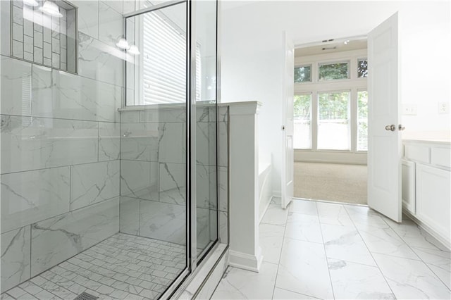3277 Wyesham Cir, Duluth, GA 30096 - full bathroom featuring marble look tiles, a shower stall, baseboards, a bathtub, and vanity