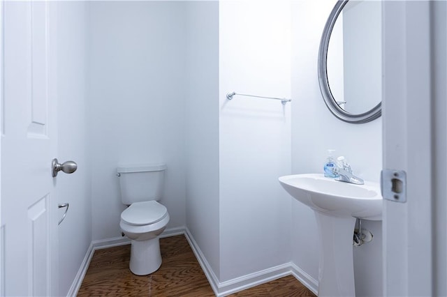 3277 Wyesham Cir, Duluth, GA 30096 - bathroom with toilet, wood finished floors, and baseboards